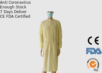 Vêtements médicaux jetables tricotés de manchettes, combinaisons jetables jaunes